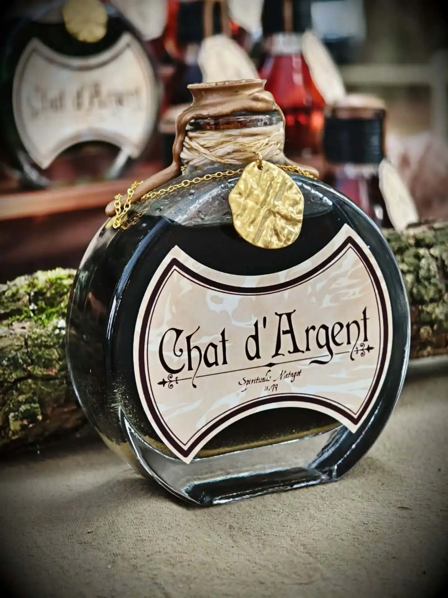 Potion de Chat d'Argent - Potion chat argent matagot fiole verte doree vue face wolfsbane studio